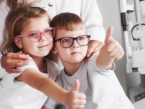 Boy and Girl with glasses